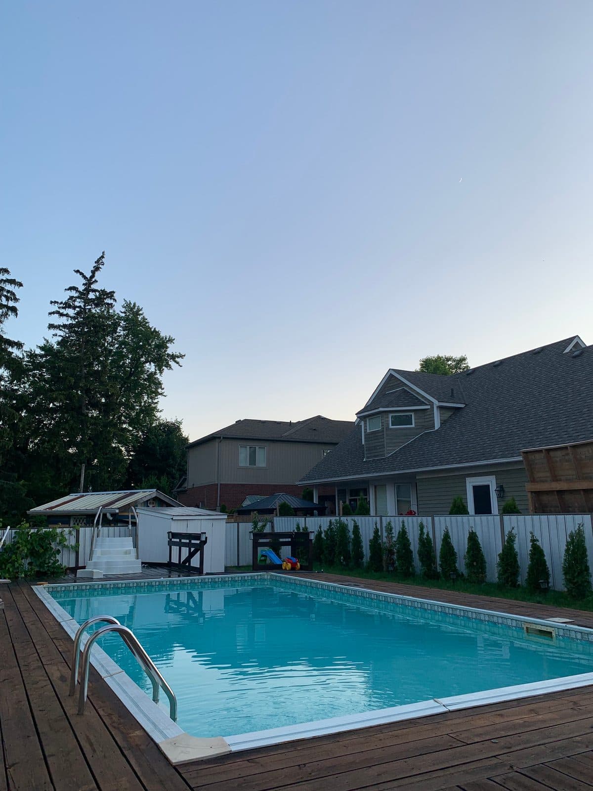 Pool cover being removed, clear spring water