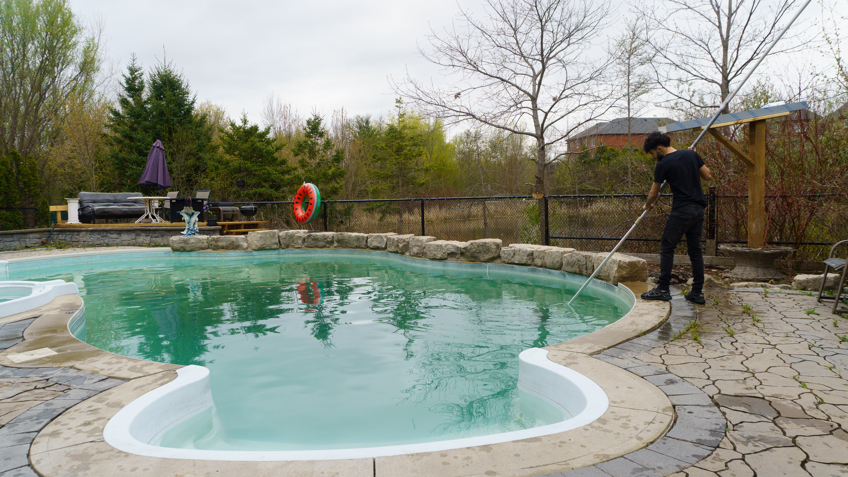 Pool Perfect team maintaining a residential pool